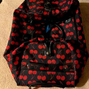 Calpak rolling carry on duffle